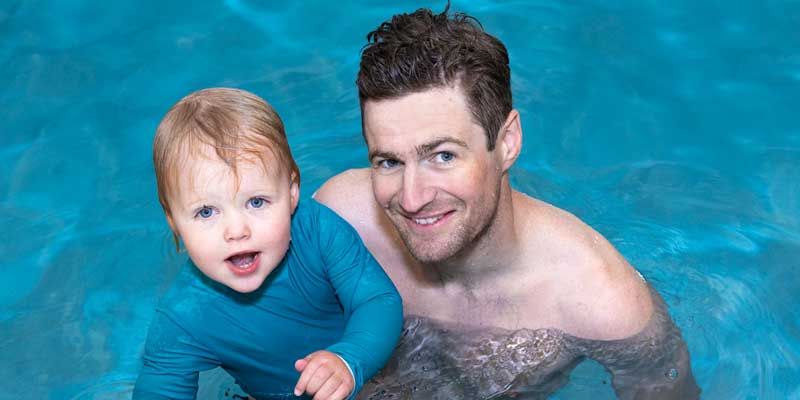 Father and child in the pool at Njswim Sparta location